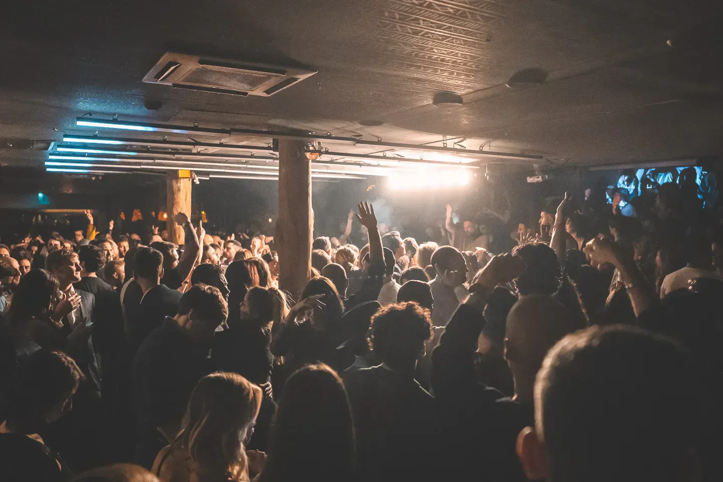 Energetic crowd at The Sanctuary nightclub in Rome, enjoying the music and atmosphere.