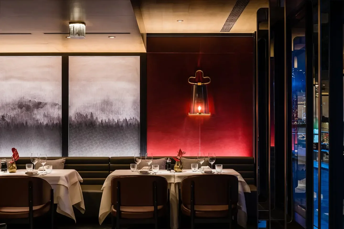 Elegant dining room at The Steak House in Hong Kong, featuring sophisticated decor.