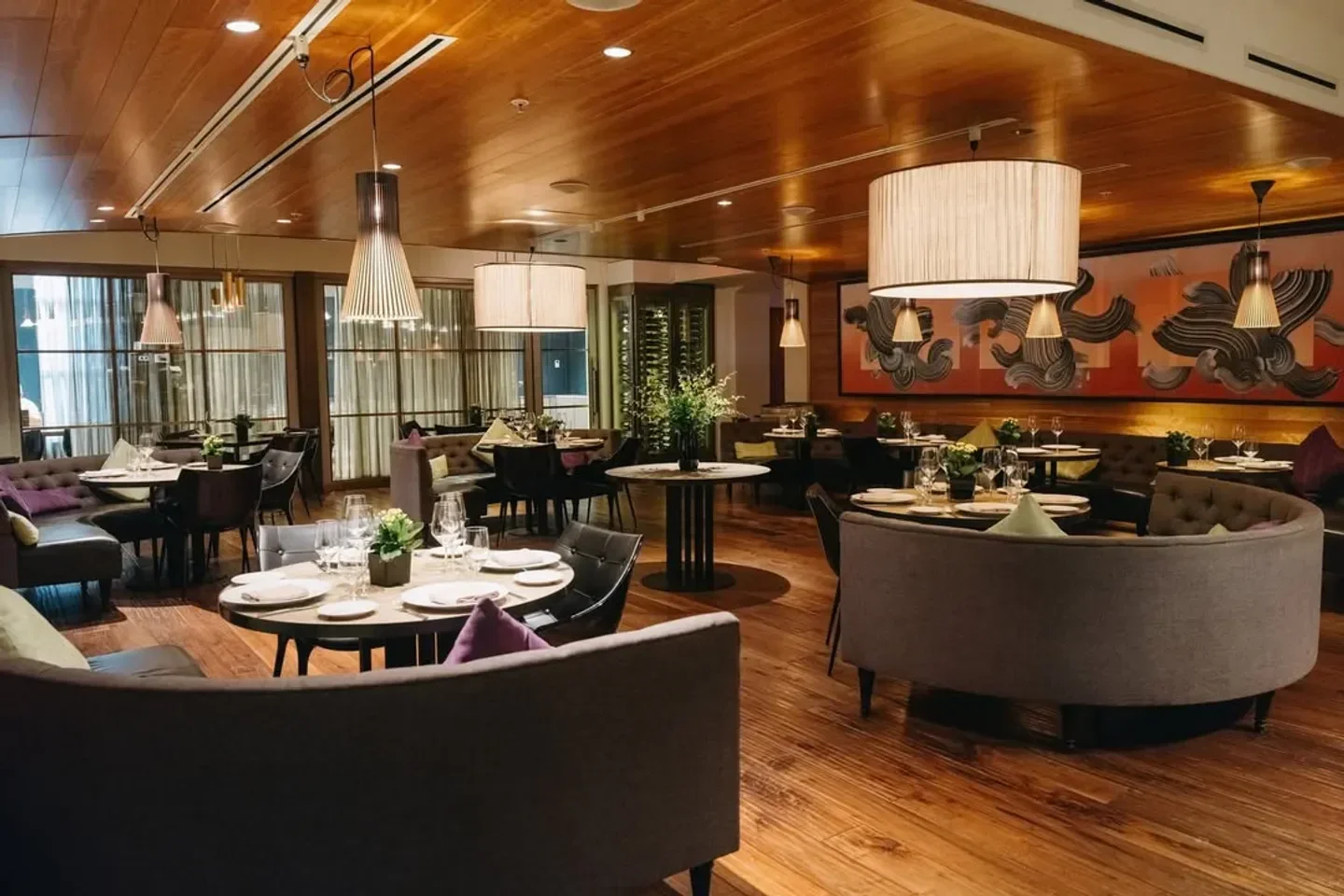 Elegant dining area at TOCA Toronto restaurant with stylish lighting and decor