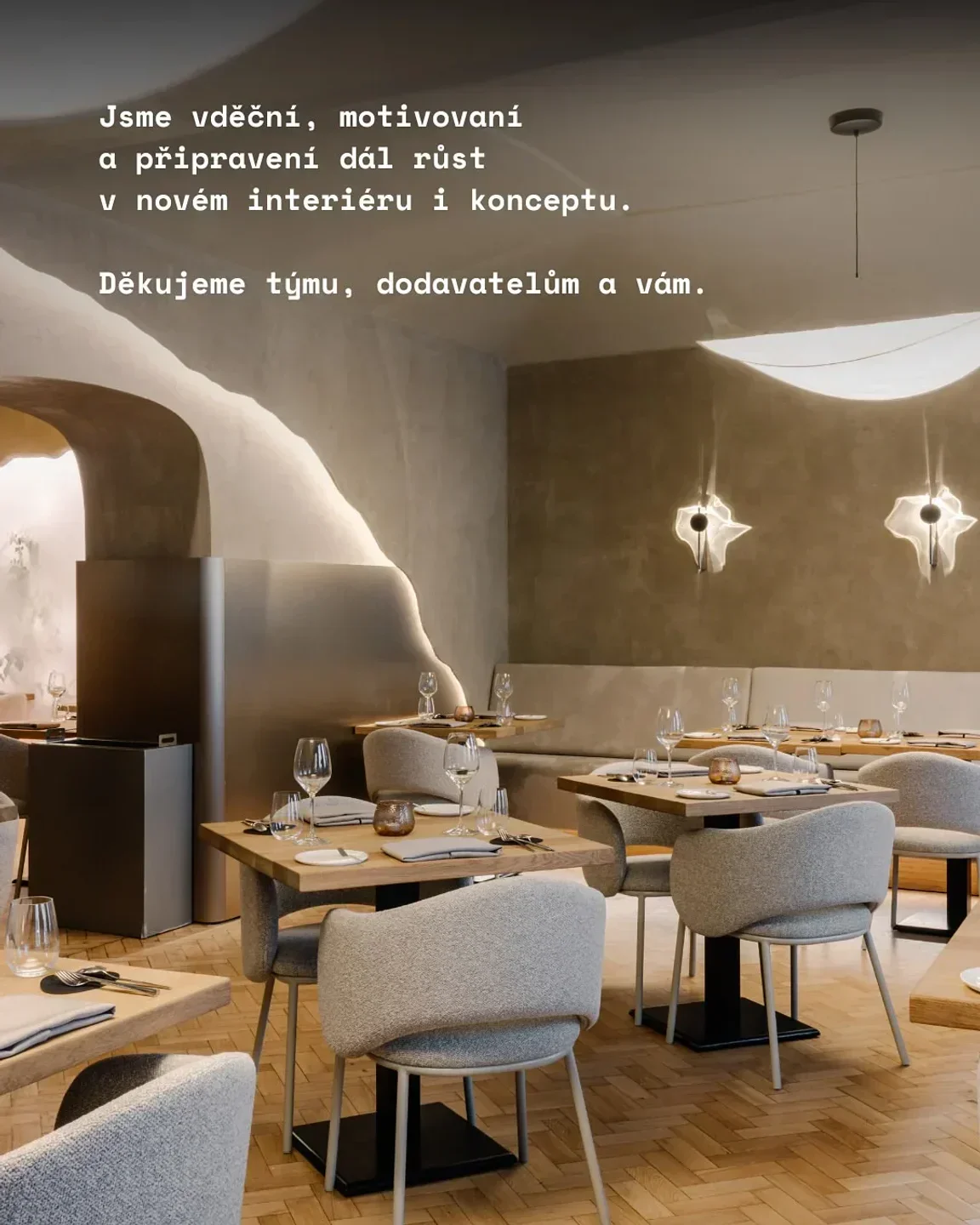 Elegant interior of V Zátiší restaurant in Prague, featuring stylish seating and lighting.