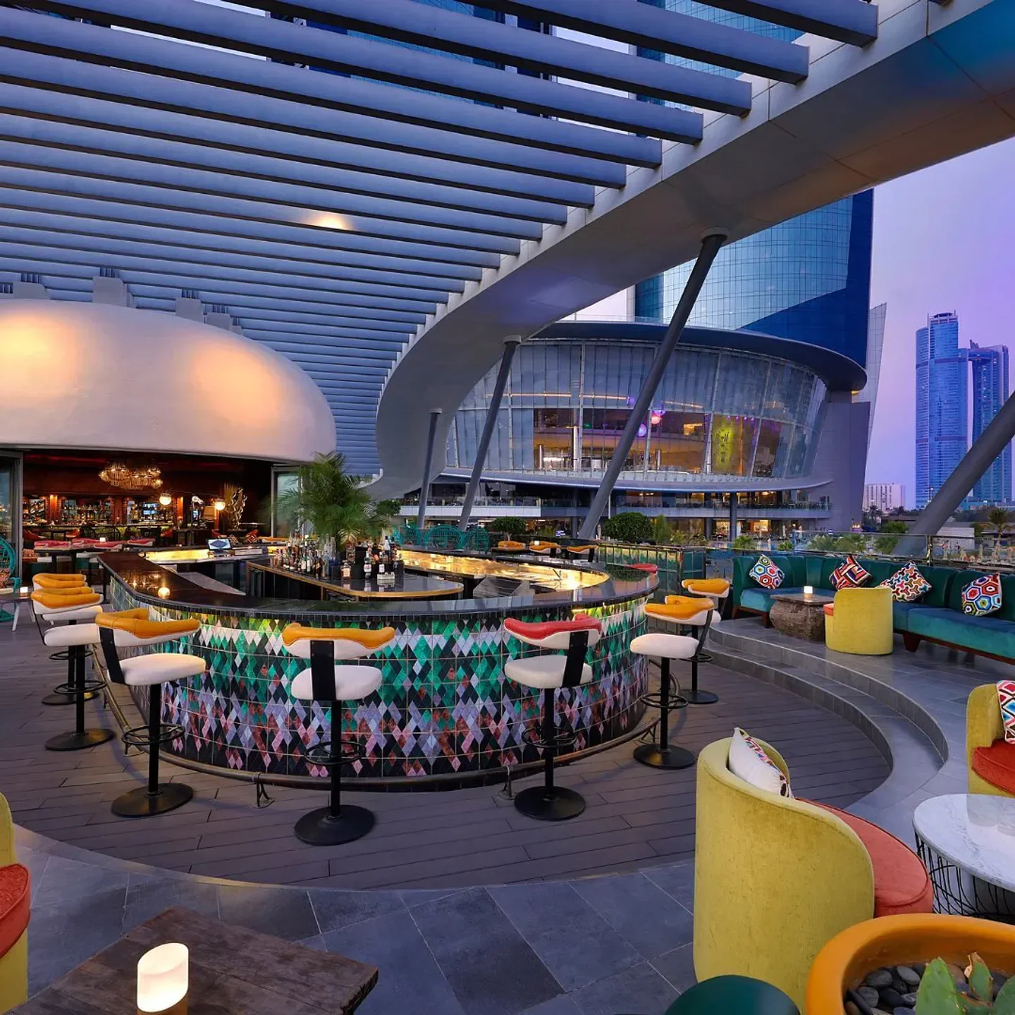 Stylish bar at VaKaVa restaurant in Abu Dhabi with unique design and city views.