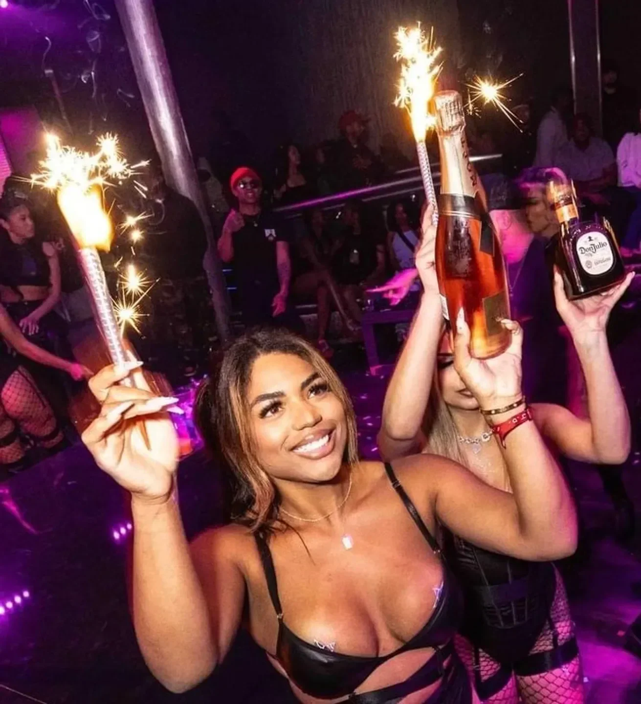 Celebrating at Vanity nightclub in San Francisco with sparklers and champagne.