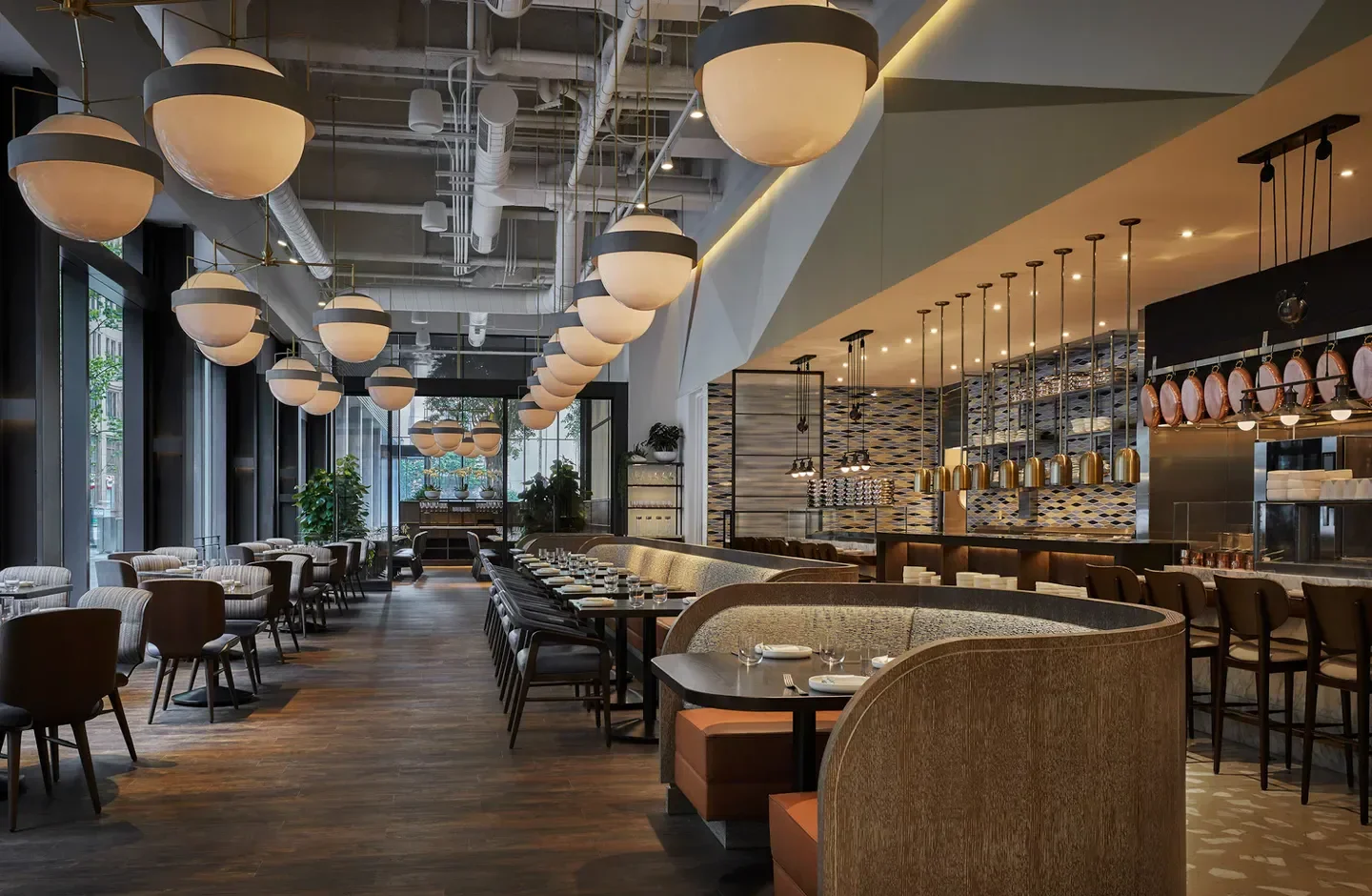 Interior of Vernick Food & Drink restaurant in Philadelphia, featuring unique lighting and booths