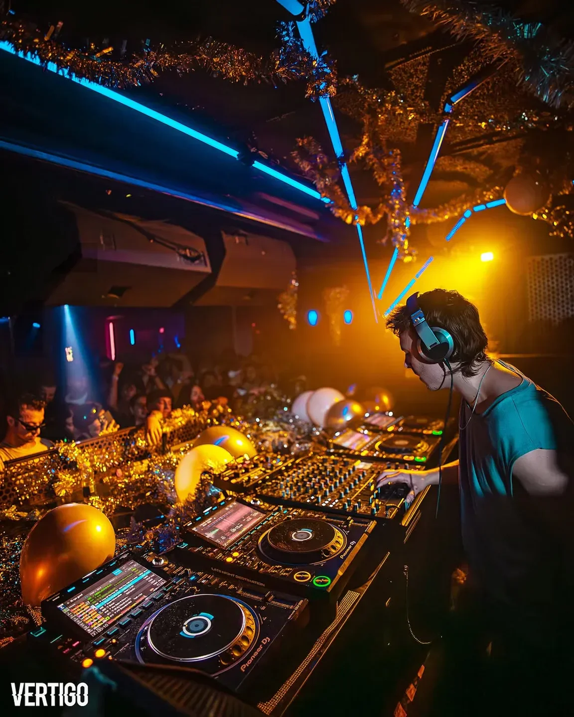 DJ at VERTIGO nightclub in Toronto, mixing with festive decorations and a vibrant atmosphere.