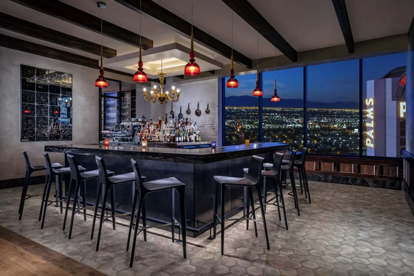 Stylish bar at Vetri Cucina Las Vegas with city views at night in Las Vegas.