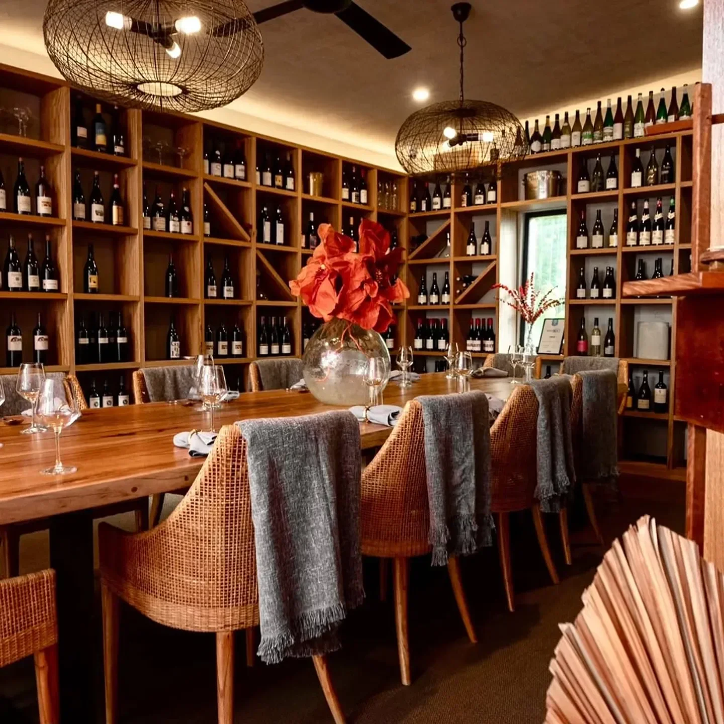 Interior of Viand restaurant in Sydney featuring elegant dining and wine selection.