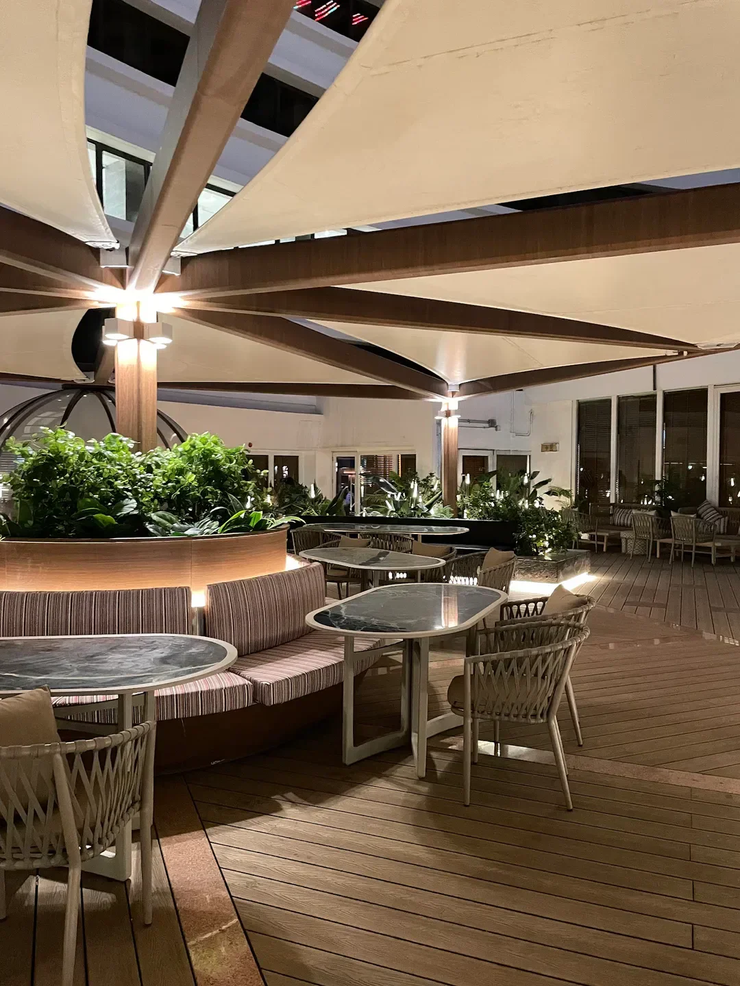 Voynich restaurant in Hong Kong: outdoor dining area with stylish seating and decor.