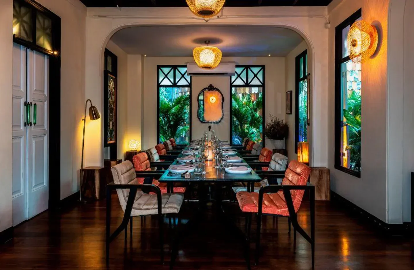 Elegant dining area at Wana Yook restaurant in Bangkok, featuring stylish decor.