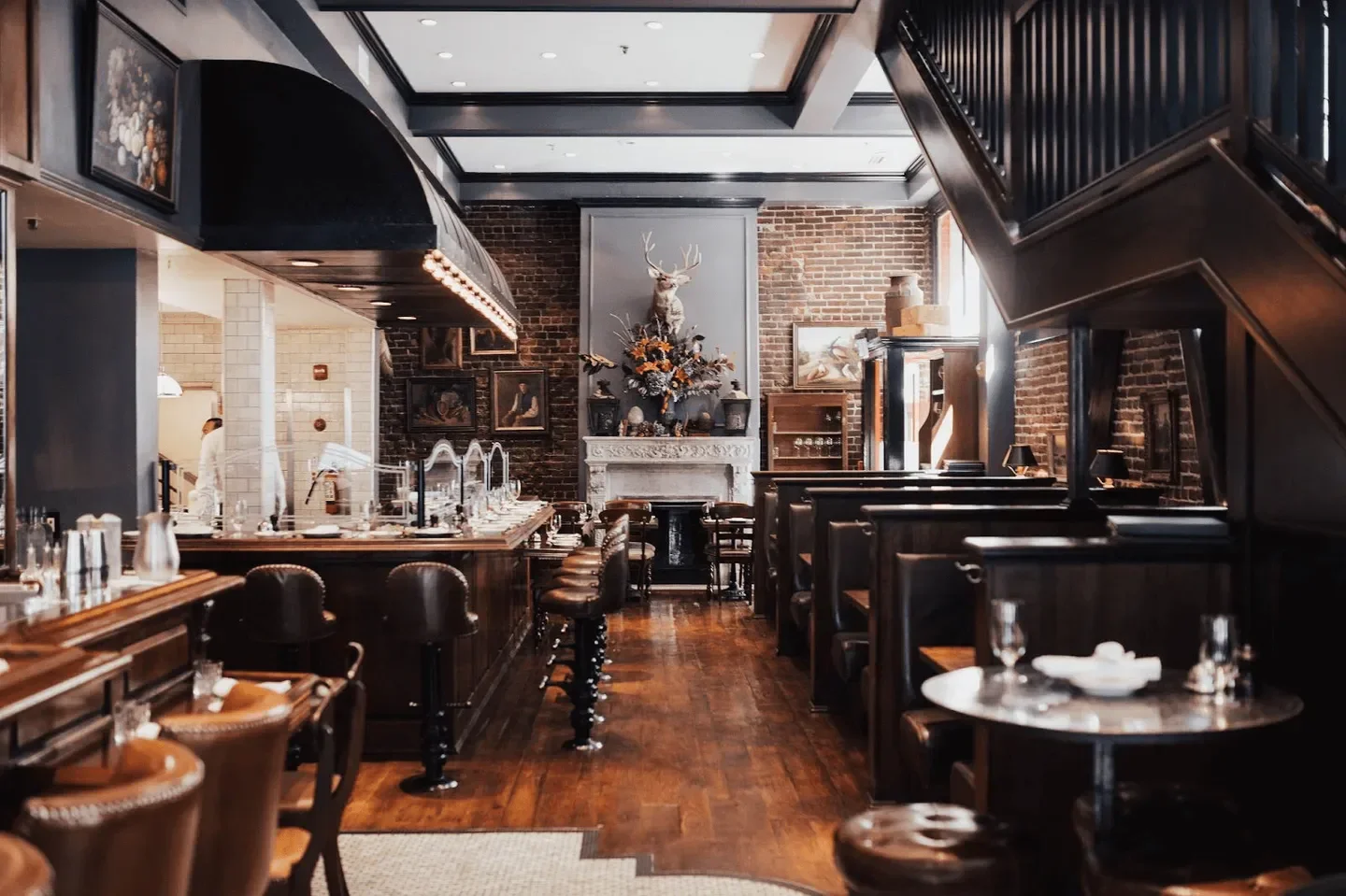 Interior of Wayfare Tavern in San Francisco, featuring rustic decor and cozy seating.