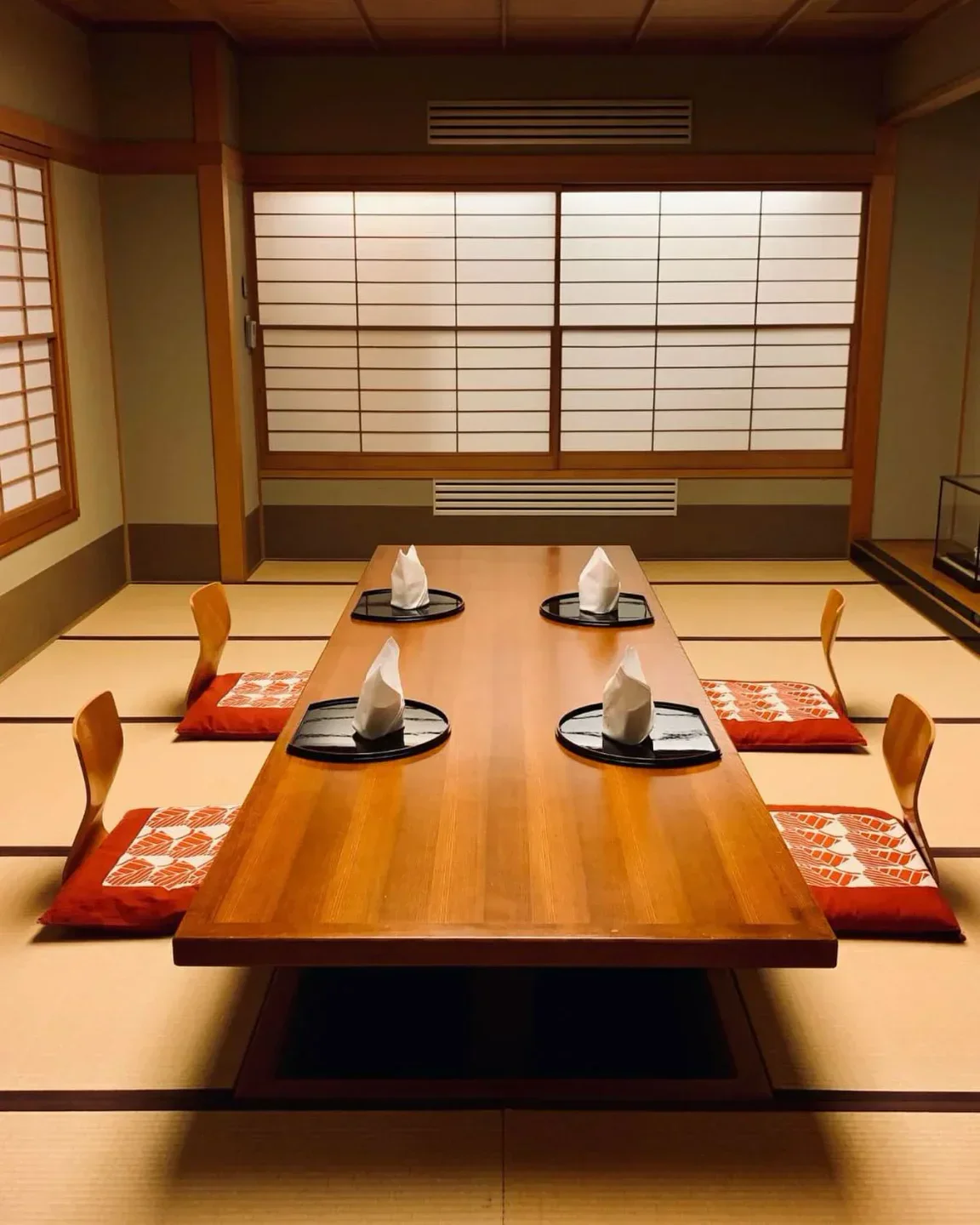 Elegant dining space at Yamazato restaurant in Amsterdam, featuring tatami mats.