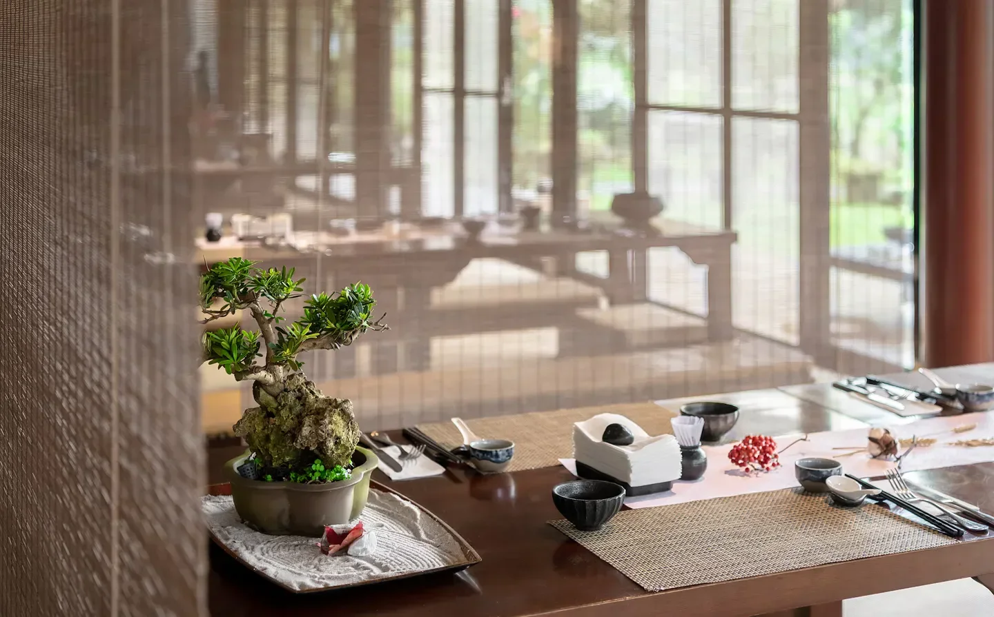 Table setting at Yangming Spring restaurant in Taipei with bonsai and elegant details