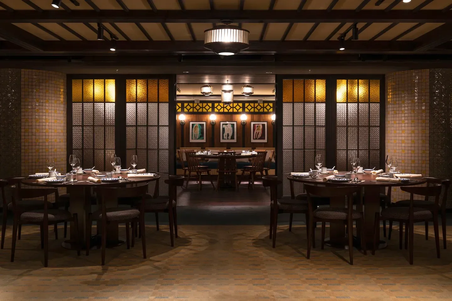 Elegant dining room at Yat Tung Heen (Jordan) in Hong Kong, ready for a meal.