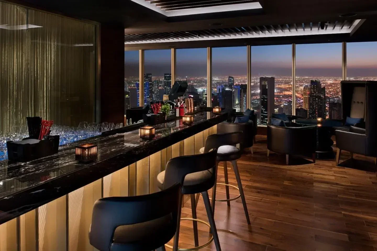 Zengo Doha rooftop bar with city views at night, perfect for dining.