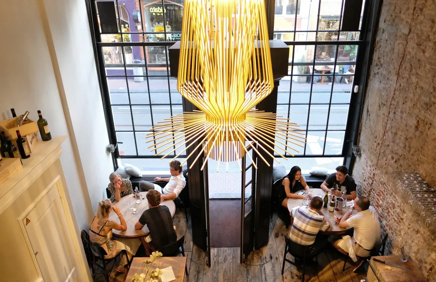High angle of diners enjoying the ambiance at Zoldering restaurant in Amsterdam.